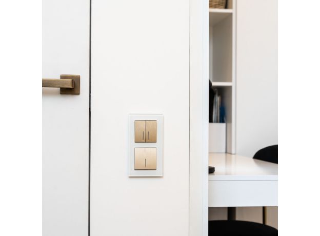 Выключатель двухклавишный проходной с подсветкой (шампань рифленый) W1122110