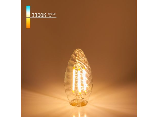 Филаментная светодиодная лампа "Свеча витая" CW35 7W 3300K E14 прозрачная BLE1413